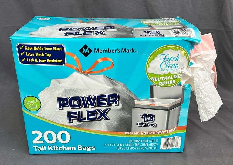Box of Power Flex 13 Gallon Tall Kitchen Trash Bags with fresh clean scent that neutralizes odors. This box is freight damaged but appears to be full.