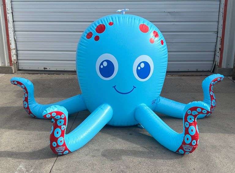 Super Cool 54" Diameter Inflatable Octopus Sprinkler.  He is 8' in diameter with a sprinkler on top of his head. This does not come with a box.