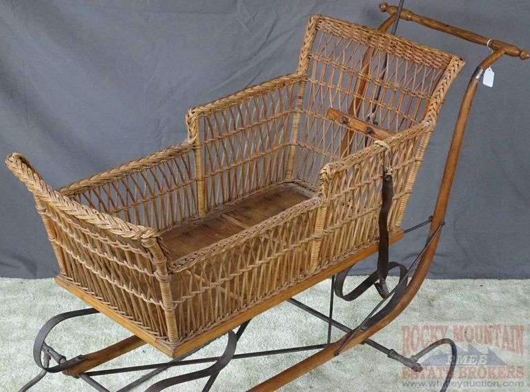 Very Hard to Find Victorian Wicker Push Sled W/ Parasol. The wicker and parasol are both in very good condition. This is a hard to find piece. Come check it out in person. 32"x46"x16.5".
