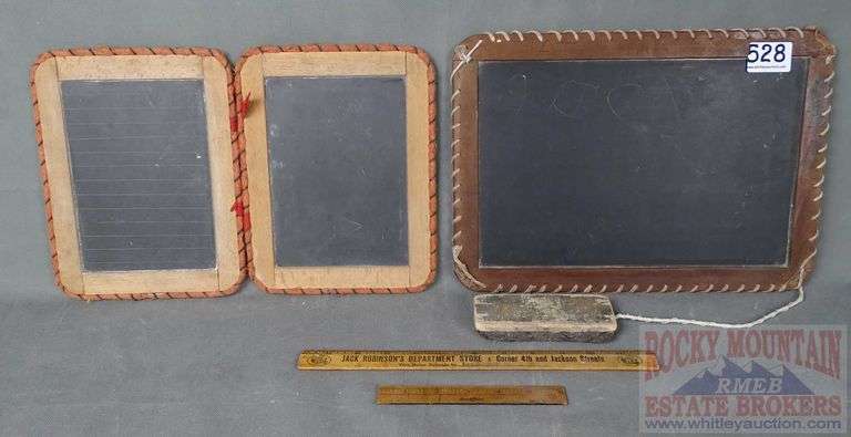 2 Vintage Slate Chalkboards, Eraser, Buster Brown Advertising Ruler & Small Wood Ruler. Largest slate is 10"x13".  All for one money.
