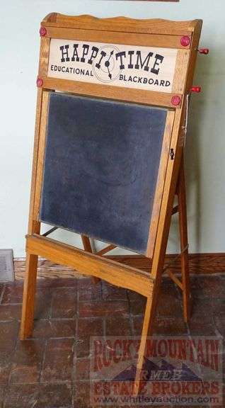 Vintage "Happi-Time" Educational Blackboard W/ Fold Down Chalkboard, Rack to Hold Your Supplies & Educational Paper Scroll. This all folds up for storage and the scroll is in great condition.