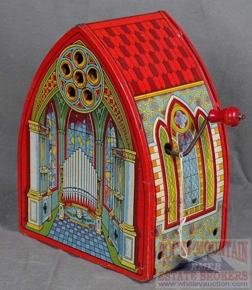 Vintage J Chein & Co. Tin Litho Cathedral Organ.  This cranks and sounds like a pipe organ.  9" High.