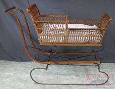 Very Hard to Find Victorian Wicker Push Sled W/ Parasol. The wicker and parasol are both in very good condition. This is a hard to find piece. Come check it out in person. 32"x46"x16.5".