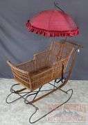 Very Hard to Find Victorian Wicker Push Sled W/ Parasol. The wicker and parasol are both in very good condition. This is a hard to find piece. Come check it out in person. 32"x46"x16.5".