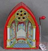 Vintage J Chein & Co. Tin Litho Cathedral Organ.  This cranks and sounds like a pipe organ.  9" High.