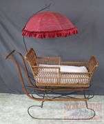Very Hard to Find Victorian Wicker Push Sled W/ Parasol. The wicker and parasol are both in very good condition. This is a hard to find piece. Come check it out in person. 32"x46"x16.5".