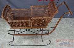 Very Hard to Find Victorian Wicker Push Sled W/ Parasol. The wicker and parasol are both in very good condition. This is a hard to find piece. Come check it out in person. 32"x46"x16.5".
