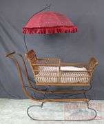 Very Hard to Find Victorian Wicker Push Sled W/ Parasol. The wicker and parasol are both in very good condition. This is a hard to find piece. Come check it out in person. 32"x46"x16.5".
