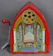 Vintage J Chein & Co. Tin Litho Cathedral Organ.  This cranks and sounds like a pipe organ.  9" High.