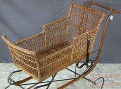 Very Hard to Find Victorian Wicker Push Sled W/ Parasol. The wicker and parasol are both in very good condition. This is a hard to find piece. Come check it out in person. 32"x46"x16.5".