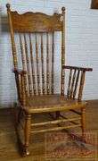 Beautiful Antique Oak Pressed Back Rocking Chair W/ Turned Spindles & Cane Seat.