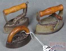 3 Small Size Antique Sad Irons W/ Wood Handles.  Three times the money.  Total bid is quantity times bid price.