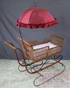 Very Hard to Find Victorian Wicker Push Sled W/ Parasol. The wicker and parasol are both in very good condition. This is a hard to find piece. Come check it out in person. 32"x46"x16.5".