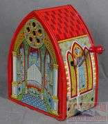 Vintage J Chein & Co. Tin Litho Cathedral Organ.  This cranks and sounds like a pipe organ.  9" High.