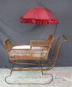 Very Hard to Find Victorian Wicker Push Sled W/ Parasol. The wicker and parasol are both in very good condition. This is a hard to find piece. Come check it out in person. 32"x46"x16.5".