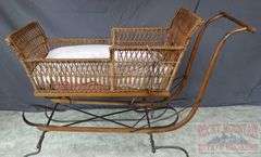 Very Hard to Find Victorian Wicker Push Sled W/ Parasol. The wicker and parasol are both in very good condition. This is a hard to find piece. Come check it out in person. 32"x46"x16.5".