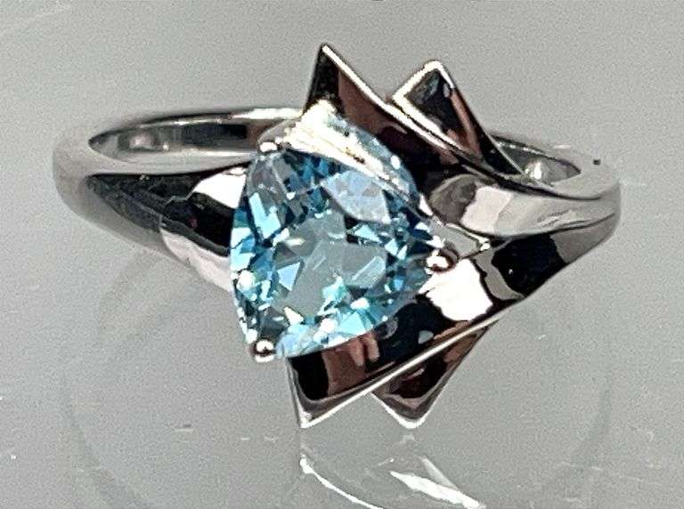 Fancy Sterling Silver & Citrine Dress Ring with an Approx. 1.5 Carat Trillion Cut Blue Topaz Center Stone, Size 7.