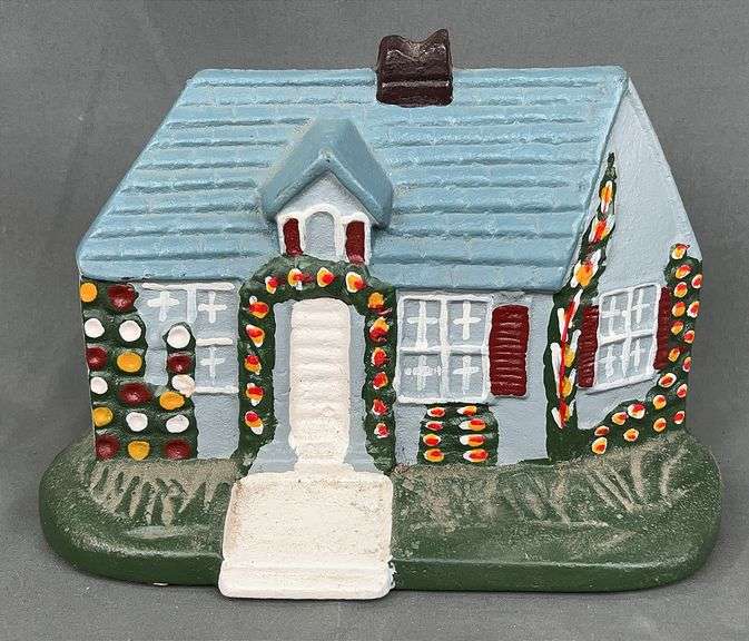 Cast Iron Cottage Painted Door Stop. 8" wide.