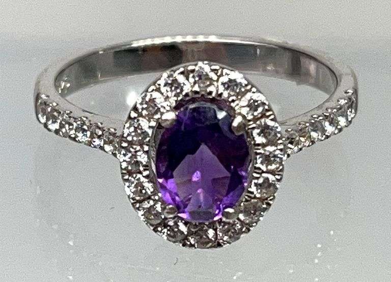 Wonderful Sterling Silver & Amethyst Dress Ring with an Approx. 2-Carat Dark Purple Oval Amethyst Center Stone with Clear Topaz Studded Band & Border, Size 10.