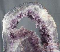 Unique Amethyst Geode Slice on Metal Stand – Elegant Open Design.