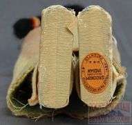 Vintage Native American Skookum Doll with Original Foot Label, 11.5" High.