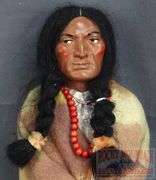 Vintage Native American Skookum Doll with Original Foot Label, 11.5" High.