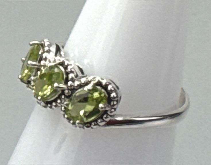 Elegant Sterling Silver Dress Ring W/ 3 Approx.1-Carat Oval Cut Peridot, Prong Set Peridot Accent Stones, Size 8.