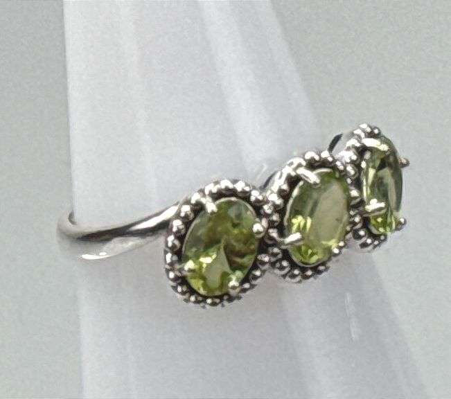 Elegant Sterling Silver Dress Ring W/ 3 Approx.1-Carat Oval Cut Peridot, Prong Set Peridot Accent Stones, Size 8.