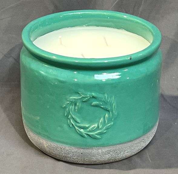 Enjoy a Mosquito-Free Evening Outdoors with a Large 7.3", 3-Wick Citronella Candle in Hand-Glazed Teal/Green Pottery Container. Long burning citronella wax naturally repels mosquitos and has a pleasant light scent. Ideal for patios, porches, gardens, campsites & more. This candle has a burn time of up to 50 hours.