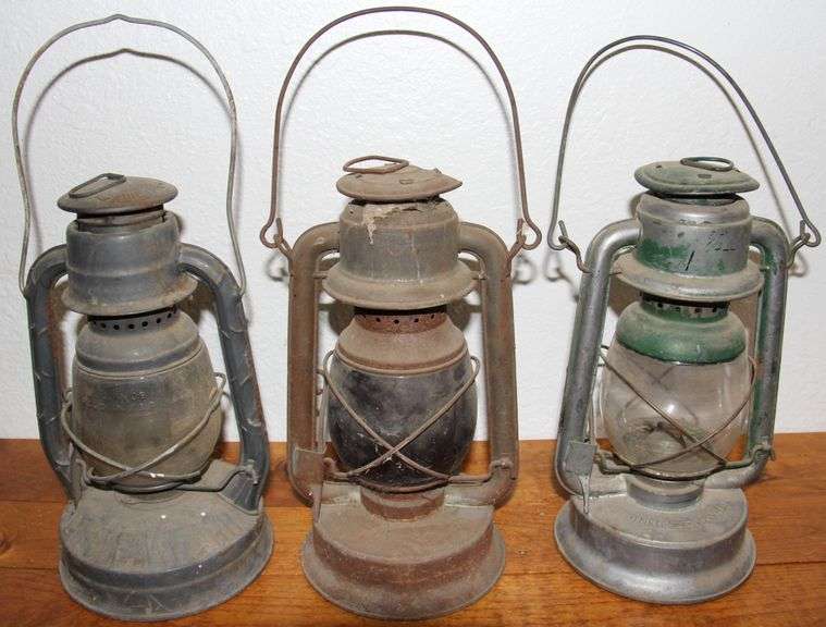 3 antique lanterns, one with a red globe, This is a great collection. 3 times the money. Total price is quantity times bid price.