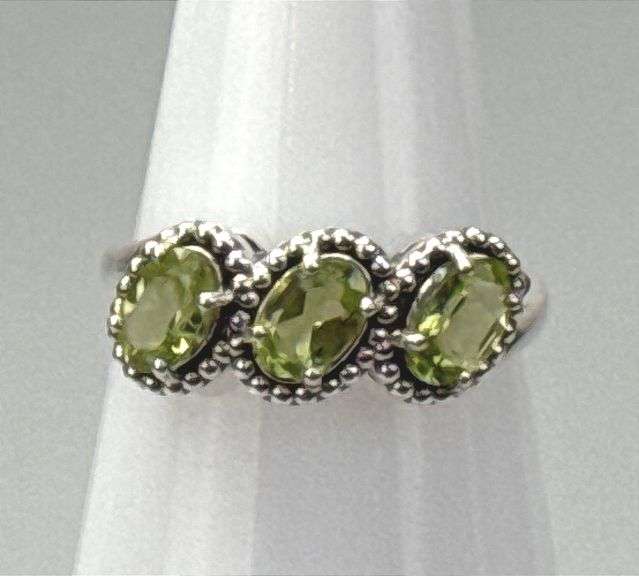 Elegant Sterling Silver Dress Ring W/ 3 Approx.1-Carat Oval Cut Peridot, Prong Set Peridot Accent Stones, Size 8.