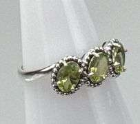 Elegant Sterling Silver Dress Ring W/ 3 Approx.1-Carat Oval Cut Peridot, Prong Set Peridot Accent Stones, Size 8.