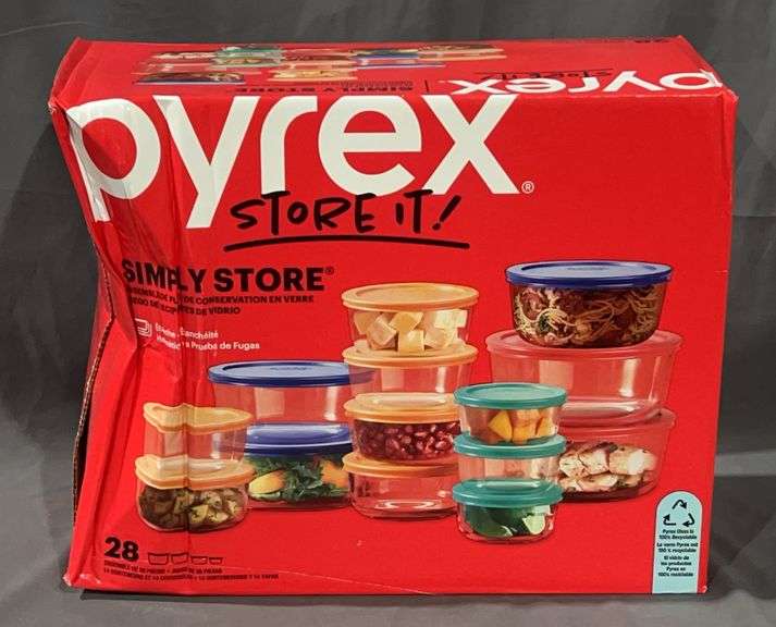 New Pyrex 28-Piece Glass Food Storage Container Set with Lids. These nest for easy storage. This is a freight damaged box, but the contents appear to be just fine.