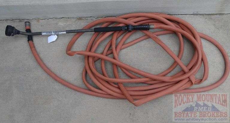 Garden Hose with Spray Nozzle.