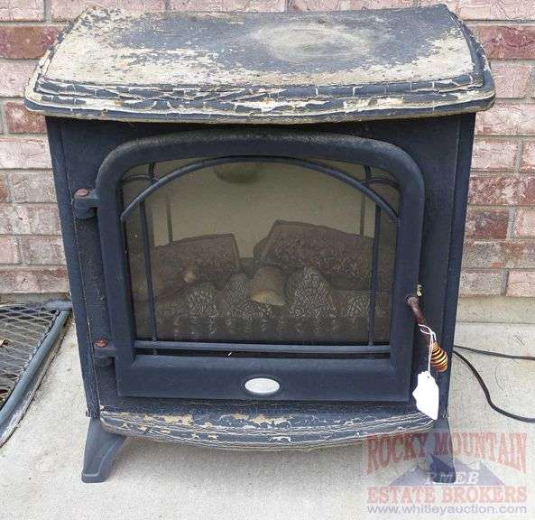 Electric Heater/Stove - Shows some wear from the weather. 26" high.