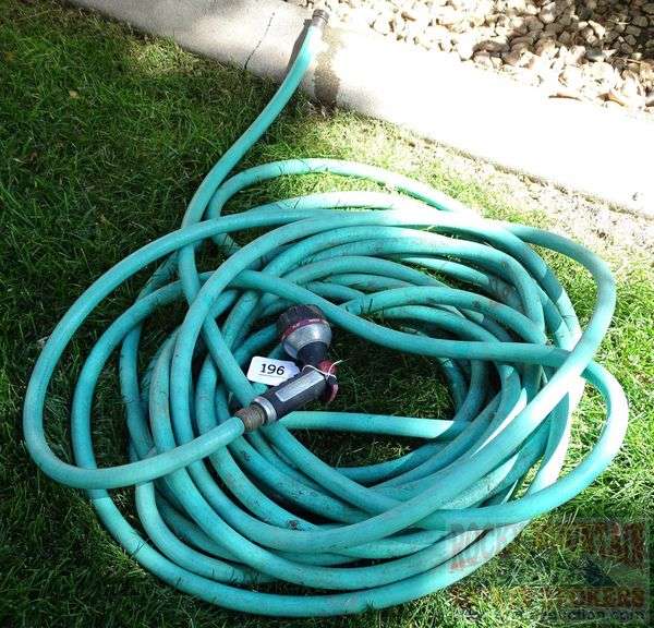 Nice Rubber Garden Hose with Spray Nozzle.