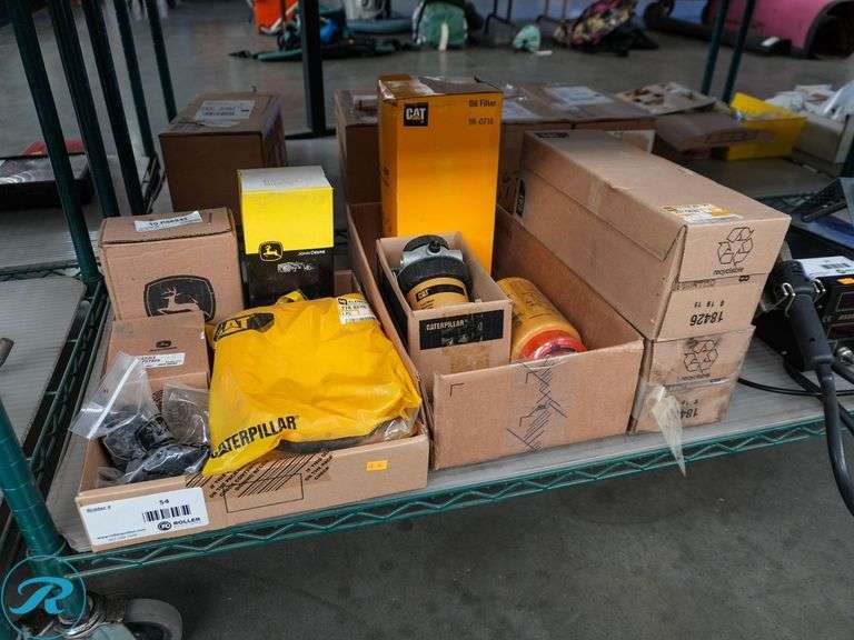 (2) Trays of Cat and John Deere Parts