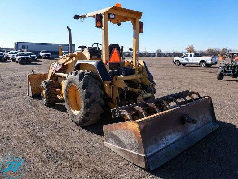 2000  John Deere  210LE  4WD  Tractor/Loader - Roller Auctions