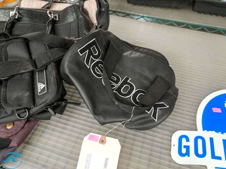 (4) Bags: Reebok, Adidas, Guess and Carhartt - Roller Auctions