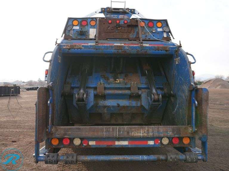 2013 Autocar ACX Xpeditor 6X4 T/A Rear Loader Trash Truck - Roller Auctions
