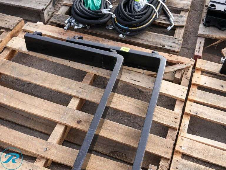 Set Of New 42" Forks - Roller Auctions