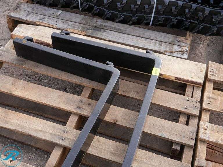 Set Of New 42" Forks - Roller Auctions