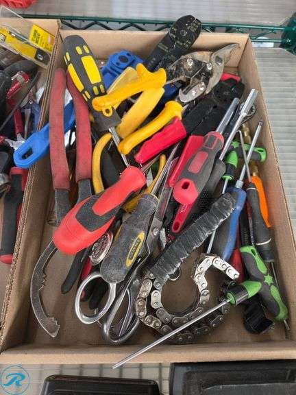 Shelf of Hand Tools and Power Tool Accessories Including Screwdrivers, Pliers, and Batteries - Roller Auctions