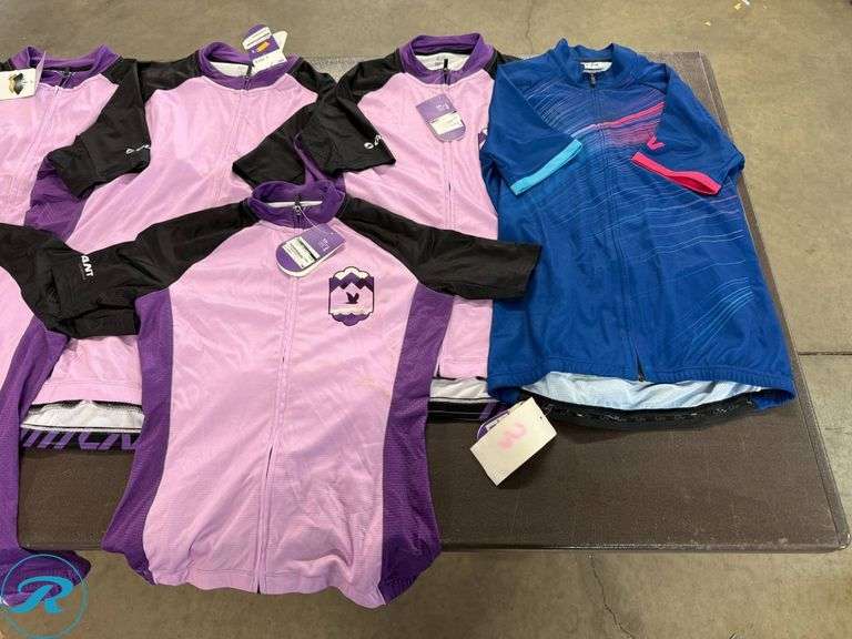 (9) Women’s Cycling Jerseys, Assorted Sizes (Stained/Dirty) - Roller Auctions