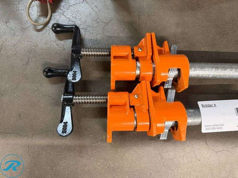 (2) Pipe Clamps - Roller Auctions