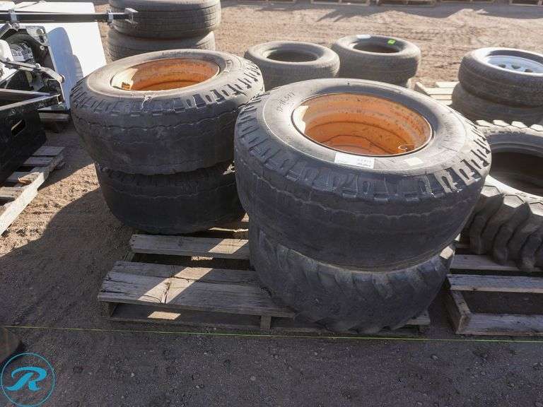 Set Of (4) Used 12-16.5 Skid Steer Tires w/ Wheels, Foam Filled - Roller Auctions