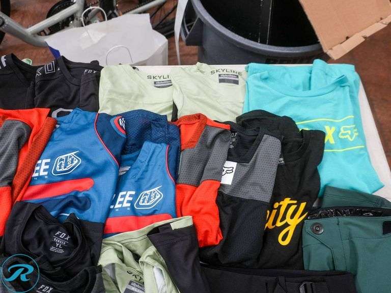 Crate of (47) Youth Cycling Shirts, Assorted Brands and Sizes - Roller Auctions