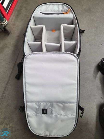 Steve Madden Backpack and Lowepro Camera Bag - Roller Auctions