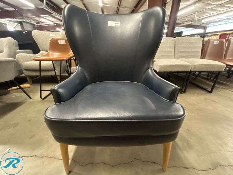 Single Blue Faux Leather Wingback Chair with Wooden Legs - Roller Auctions