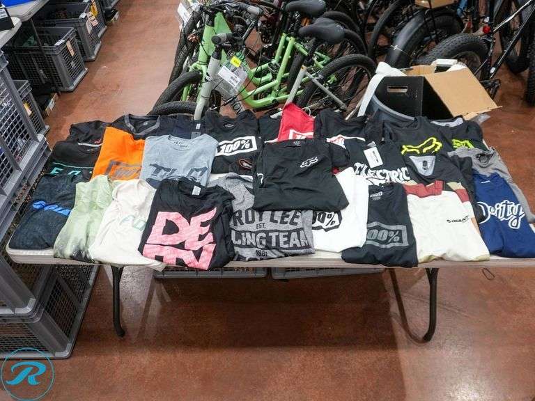 Crate of (56) Men's Cycling Shirts, Size M, Assorted Brands - Roller Auctions